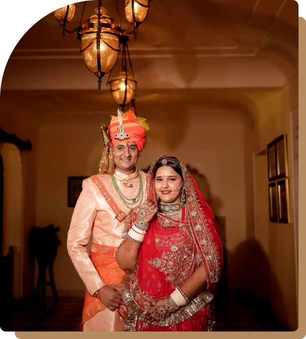 A couple in traditional dress proudly displays their cultural heritage.
