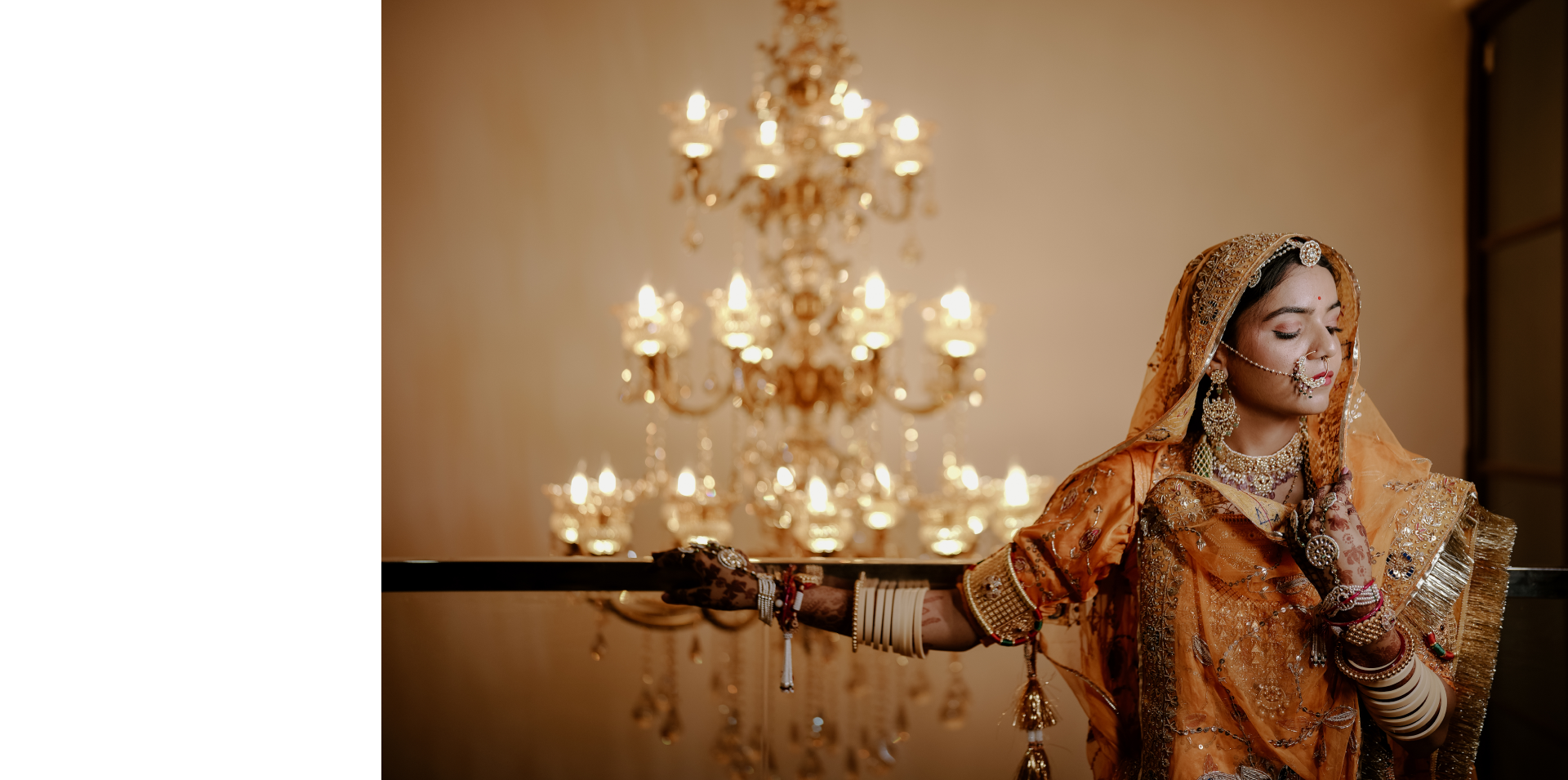 A beautiful bride in a striking orange sari.