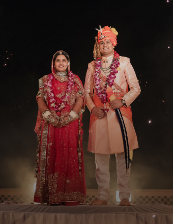 A romantic wedding photograph of a couple in Jaipur, highlighting the intricate details of their attire and the city's rich heritage.